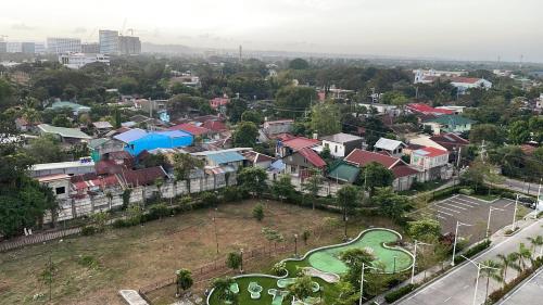 an aerial view of a city with houses at Condotel810byWVtowers1&2 in Iloilo City