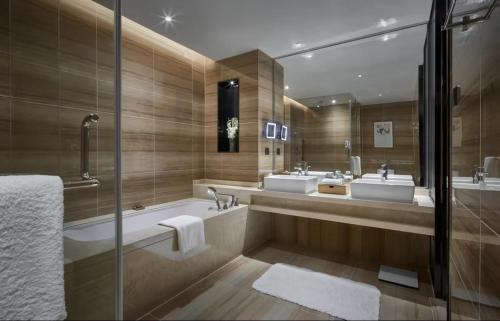 Ένα μπάνιο στο HongQiao ZZ-IHome Prime Residence Apartment - National Exhibition Center