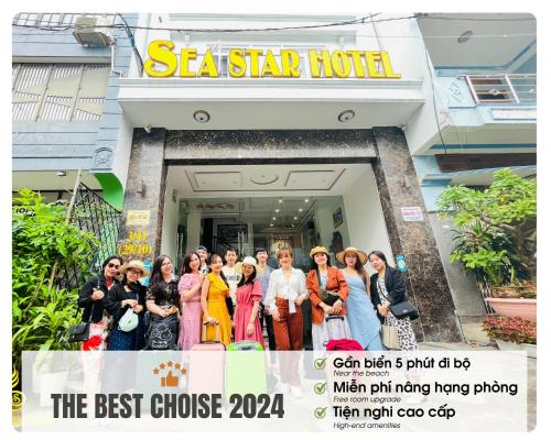 a group of people standing outside of a sa star hotel at Sea Star Hotel Quy Nhon in Quy Nhon