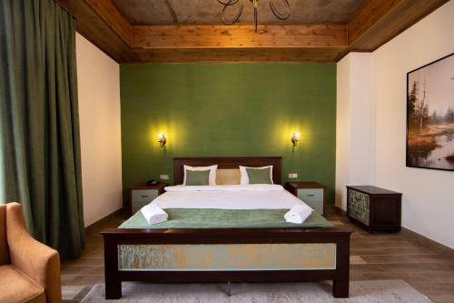 Łóżko lub łóżka w pokoju w obiekcie Xınalı Hotel & Restaurant