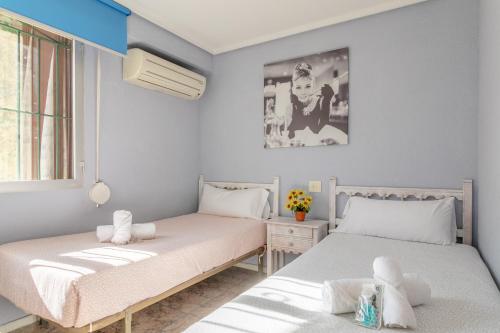 Postel nebo postele na pokoji v ubytování Sunflower Salamanca