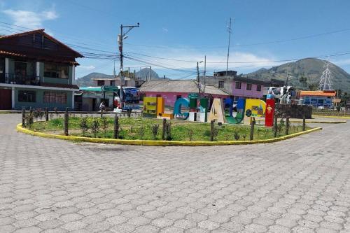 a roundabout in the middle of a town at Casa Andina Los Ilinizas in Chaupi