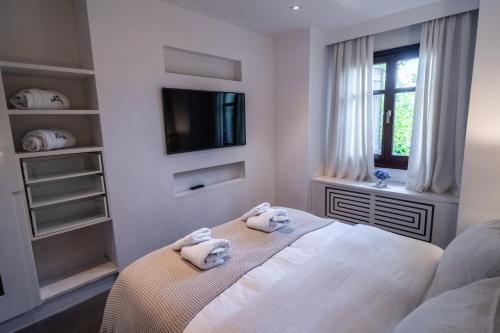Postel nebo postele na pokoji v ubytování 12 Months Resort & Spa