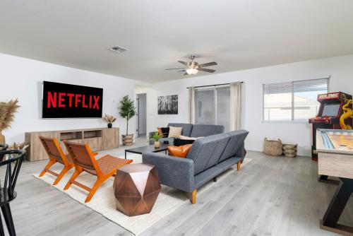 a living room with a couch and chairs at *Family Oasis*Shuffleboard*Backyard*Arcade*Garage* in Casa Grande