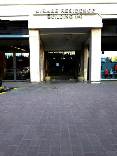 a building with the entrance to a building at Modern apartment in Cairo