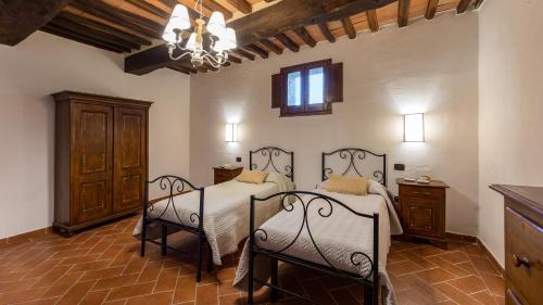 Postel nebo postele na pokoji v ubytování VILLA STRONCOLI 14, Emma Villas