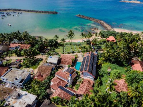 an aerial view of the resort and the ocean at Shangrela Beach Resort by ARK in Ambalangoda