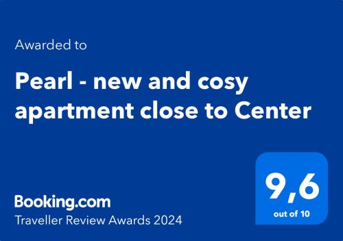 Ett certifikat, pris eller annat dokument som visas upp på Pearl - new and cosy apartment close to Center