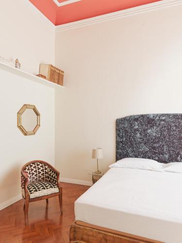 Ένα ή περισσότερα κρεβάτια σε δωμάτιο στο Palazzina Maresa