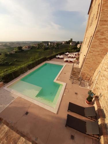 an overhead view of a swimming pool on a building at Palazzo Riccucci in Montappone