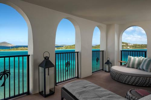 a room with a view of the ocean at The Ritz-Carlton St. Thomas in Benner