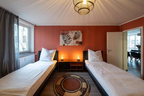 Llit o llits en una habitació de 3 Betten 75m² Zentral Aussicht