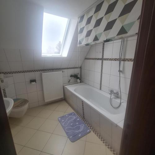 Ванна кімната в Haus Dithmarschen