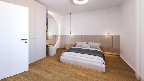 a bedroom with a large bed in a room at Lifestyle Apartments Dante in Bardolino