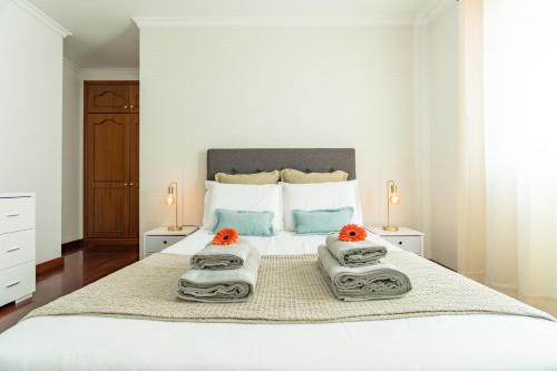 Postel nebo postele na pokoji v ubytování Apartamento Netos - By WeHost Madeira