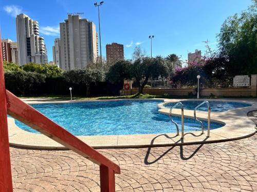 a swimming pool in the middle of a city at Neptuno View 22 in Benidorm