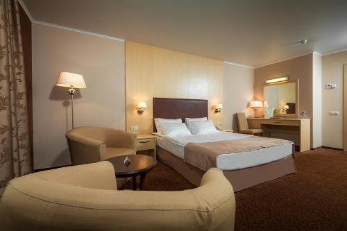 Katil atau katil-katil dalam bilik di Victoria Hotel