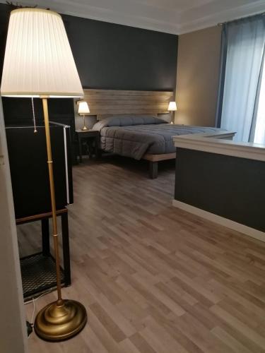 Postel nebo postele na pokoji v ubytování B&Bed 384 GuestHouse Rooms Enna