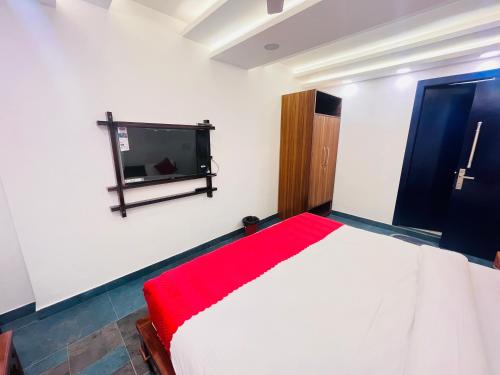 Ένα ή περισσότερα κρεβάτια σε δωμάτιο στο Hotel Green Galaxy - Green Park South Delhi
