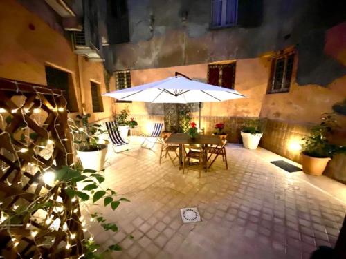 En terrasse eller udendørsområde på NAVONA DOMITIA HOME