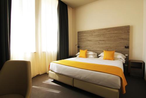 Postel nebo postele na pokoji v ubytování Sole Hotel Verona