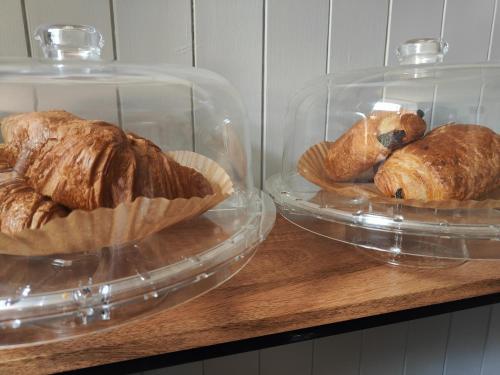 two glass containers filled with different types of bread at The Garway in Torquay
