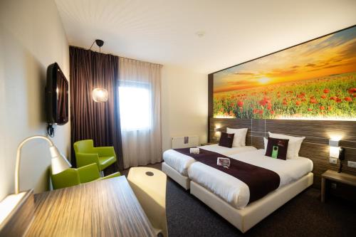 Postel nebo postele na pokoji v ubytování Hotel-Restaurant Horizon Ath-Lessines