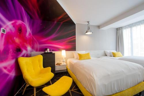 Un ou plusieurs lits dans un hébergement de l'établissement Science Hotel