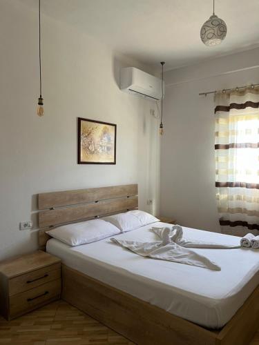 Postel nebo postele na pokoji v ubytování Hotel Apostoli