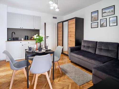 Posedenie v ubytovaní Villa Łeba II - Loft Apartments
