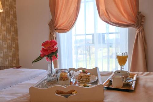 Un ou plusieurs lits dans un hébergement de l'établissement Hotel Tommy Wellness & Spa