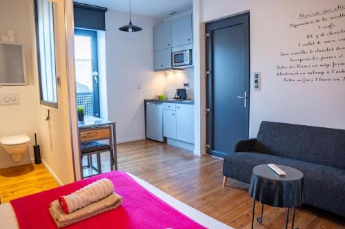 Ruang duduk di DORMIR EN VILLE - À 450 m du centre historique
