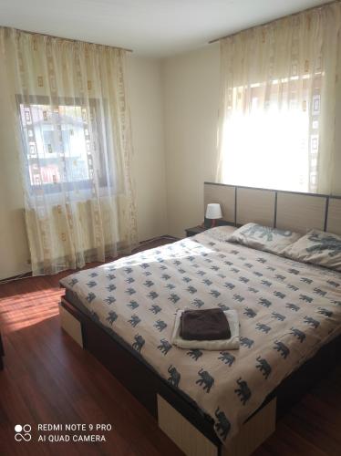 Uma cama ou camas num quarto em Vila Maria
