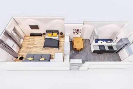 un modello di soggiorno con divano e tavolo di Cosy Apartment plus Self Checkin plus free Street parking a Berlino