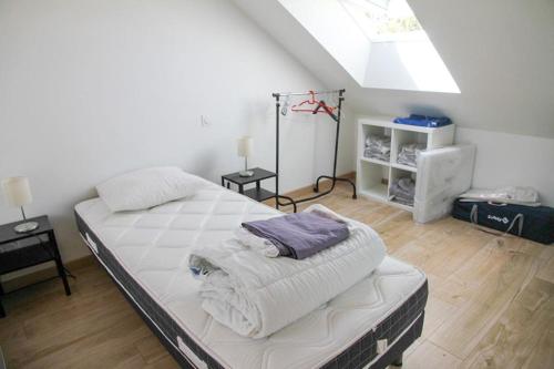 Postel nebo postele na pokoji v ubytování Gîte du Pavement