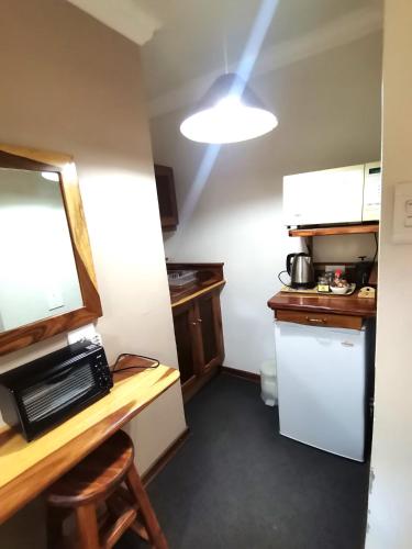 Η κουζίνα ή μικρή κουζίνα στο Kleine Eden Guesthouse