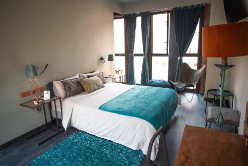 Letto o letti in una camera di Hotel Lincoln Lounge