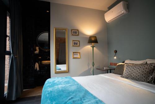 Letto o letti in una camera di Hotel Lincoln Lounge