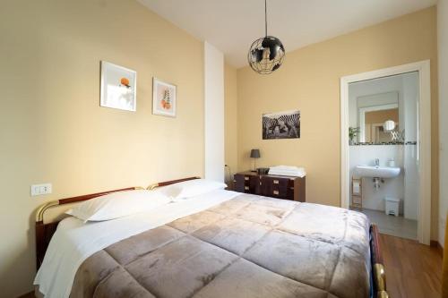 Ένα ή περισσότερα κρεβάτια σε δωμάτιο στο Borgo dalle Tovaglie