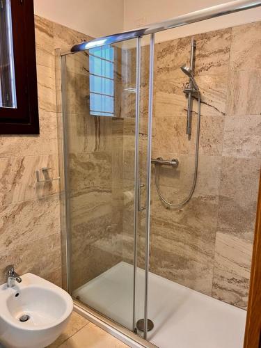 a bathroom with a shower and a sink at Alloggio Aquila d'Oro in Creazzo