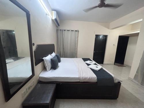Ένα ή περισσότερα κρεβάτια σε δωμάτιο στο Pearl bliss villa Calangute