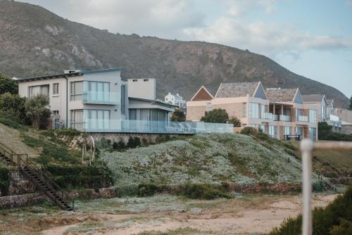 a row of houses on top of a hill at At Last Glentana Beach Manor in Glentana