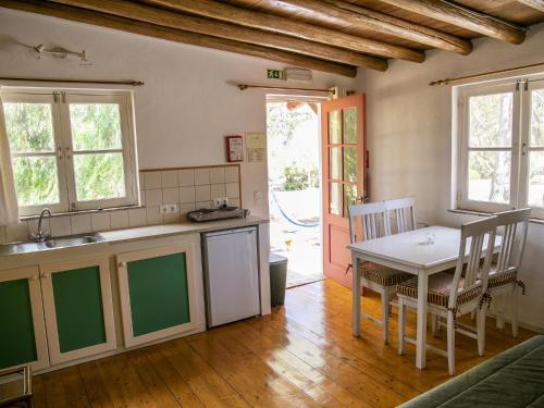 O bucătărie sau chicinetă la Monte Rosa Rural Guesthouse