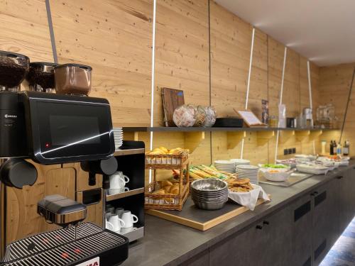 Al Piccolo Hotelにあるキッチンまたは簡易キッチン