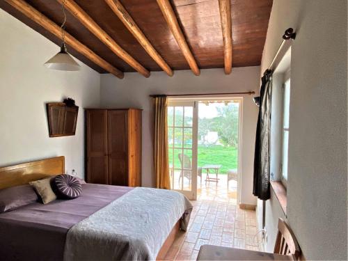 Un pat sau paturi într-o cameră la Monte Rosa Rural Guesthouse