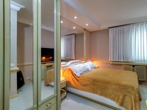 Postel nebo postele na pokoji v ubytování More num Lindo Apart Hotel Frontal Mar no Rio =D