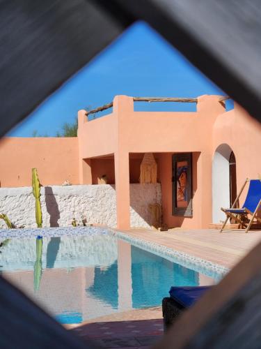 a view of a house with a swimming pool at Villa Al Kharoube in Essaouira