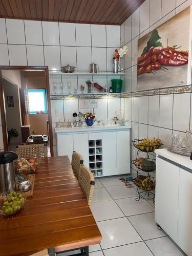 A cozinha ou kitchenette de Casa Aconchego