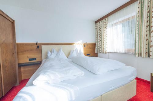 Postel nebo postele na pokoji v ubytování Appartement Christian