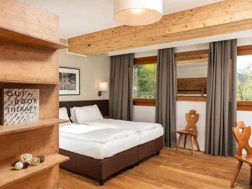 Posteľ alebo postele v izbe v ubytovaní Hotel Orso Grigio